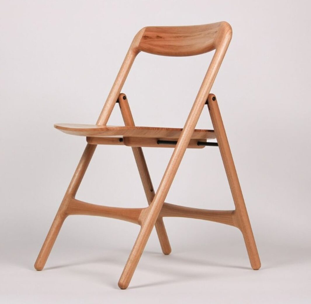 A folding solid timber chair