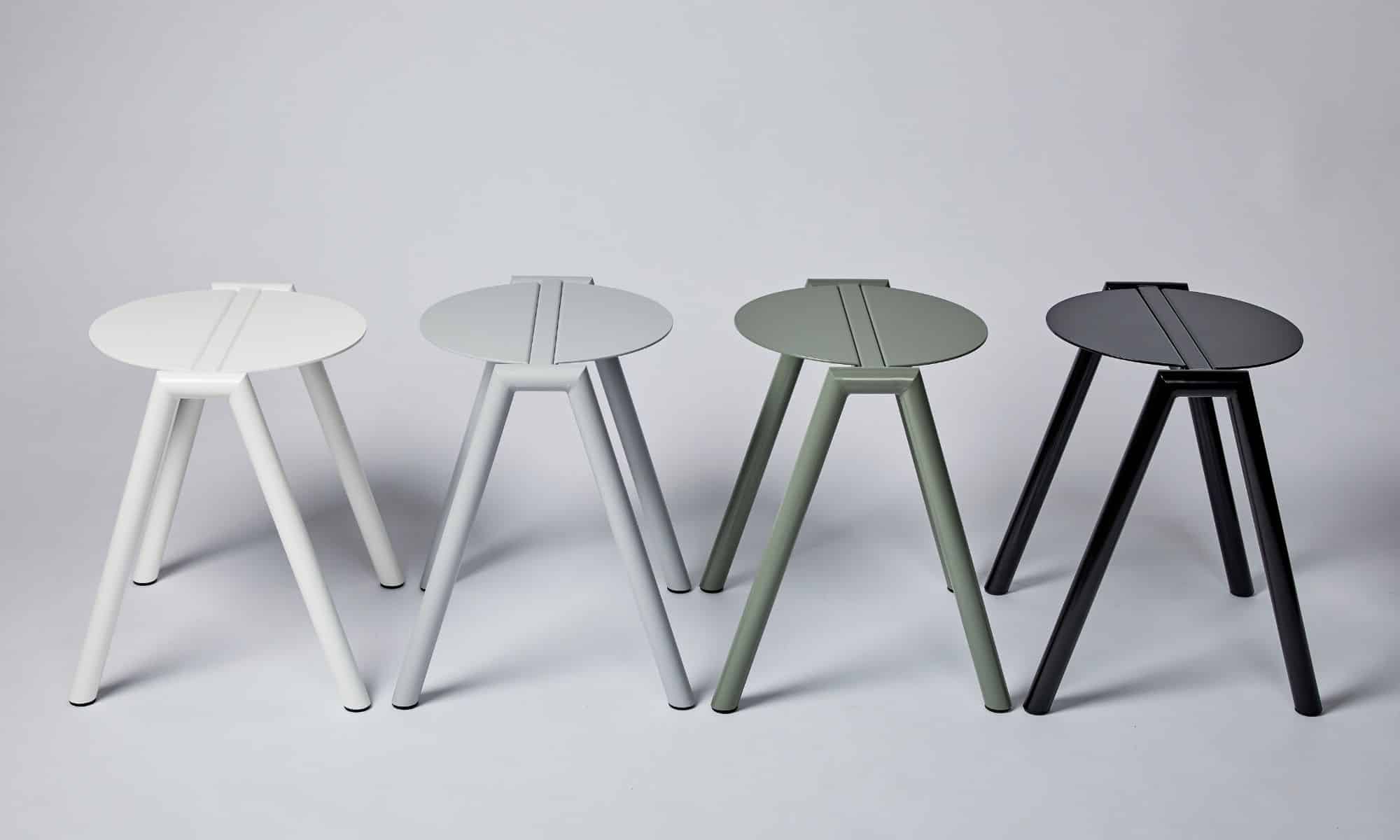 Row of 4 metal contemporary designed stools by Furnished Forever