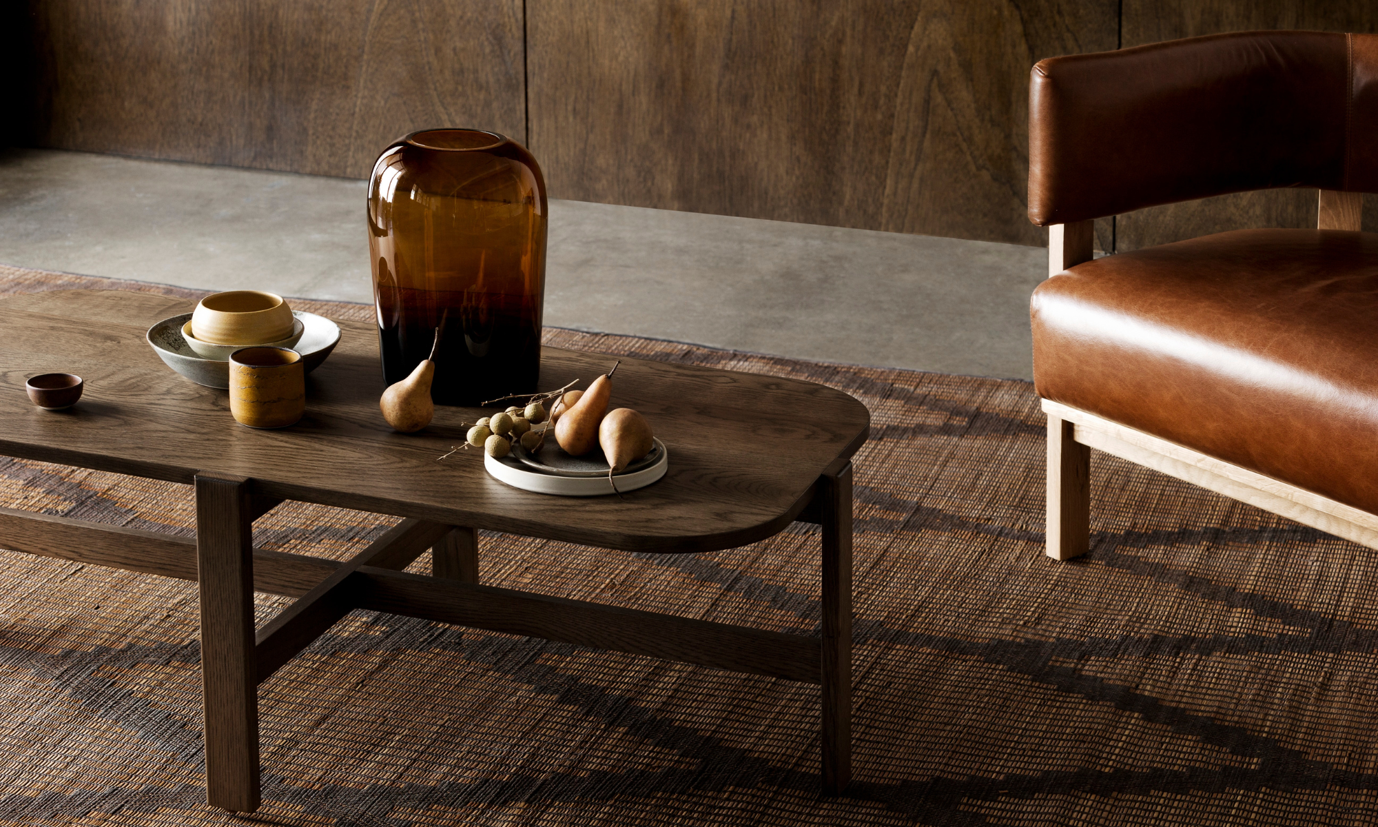 Anaca coffee table styled with vase and pears