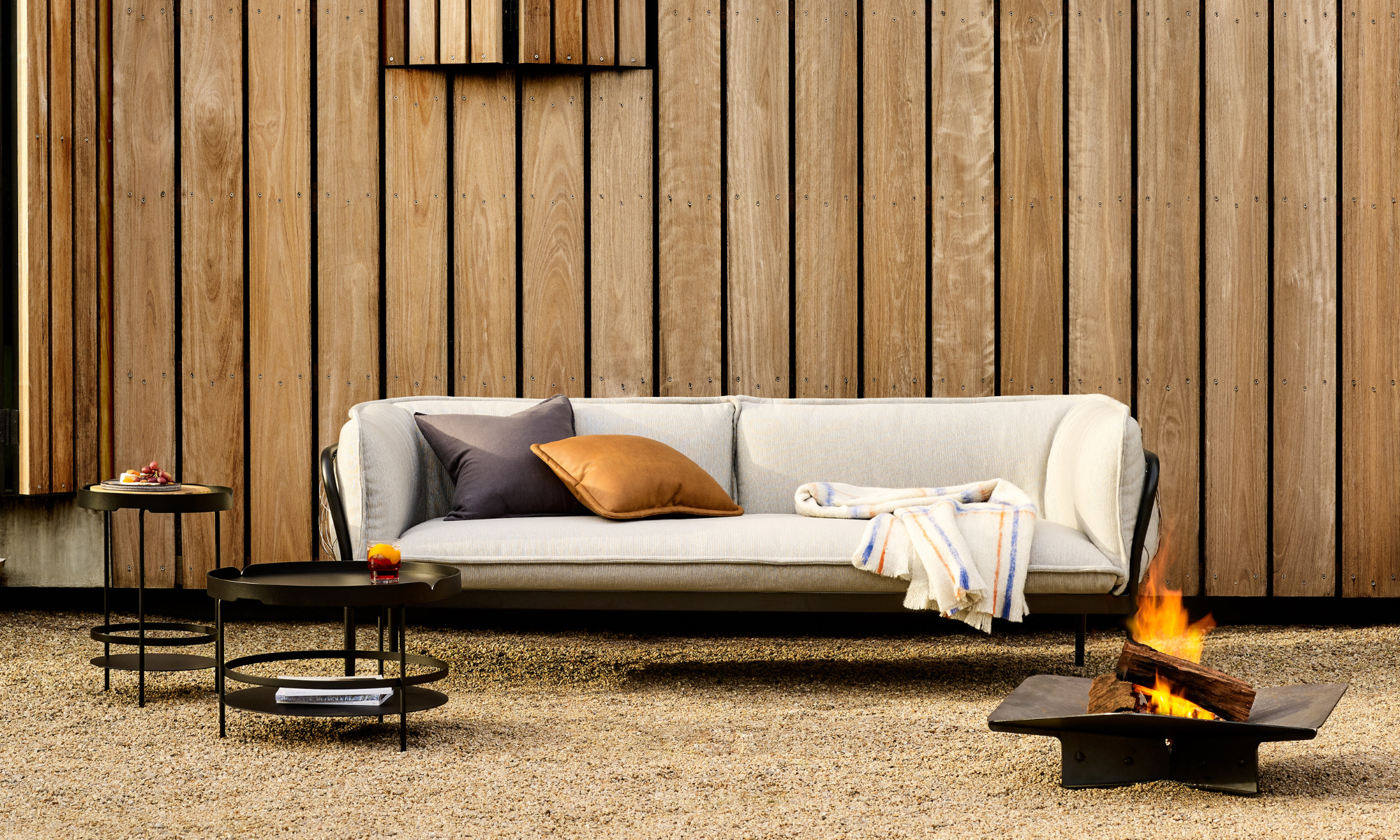 Tait outdoor lounge setting with fire pit